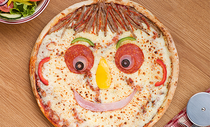 Pizza mit Gesicht